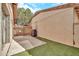 Outdoor patio space featuring concrete flooring, green turf, and a wooden fence at 14801 N 25Th Dr # 2, Phoenix, AZ 85023
