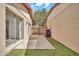Outdoor patio space featuring concrete flooring, green turf, and a wooden fence at 14801 N 25Th Dr # 2, Phoenix, AZ 85023