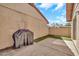 Outdoor patio space featuring concrete flooring, green turf, and a grill at 14801 N 25Th Dr # 2, Phoenix, AZ 85023