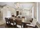 Open-concept dining area showcases a large table and a seamless transition to the inviting living spaces at 15064 N 54Th Way, Scottsdale, AZ 85254