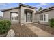 Inviting stucco home with a covered entrance, desert landscaping, and plenty of natural light at 15064 N 54Th Way, Scottsdale, AZ 85254