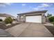 Attached two-car garage with a spacious driveway, perfect for parking and easy access at 15064 N 54Th Way, Scottsdale, AZ 85254