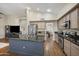Spacious kitchen boasts an island, stainless steel appliances and a view to living area at 15064 N 54Th Way, Scottsdale, AZ 85254