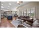 Bright, open-concept living space with an island and dining area offer seamless living and entertaining at 15064 N 54Th Way, Scottsdale, AZ 85254
