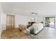 Cozy living room featuring tile flooring, a fireplace, and sliding doors to the backyard at 1821 E Patrick Ln, Phoenix, AZ 85024