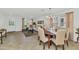 Open living room and dining area features neutral tones and natural light throughout at 1821 E Patrick Ln, Phoenix, AZ 85024