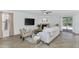 Open living room with corner fireplace, neutral tones, and easy access to the outdoor pool at 1821 E Patrick Ln, Phoenix, AZ 85024