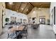 Large common area with tables, chairs, and lounge seating for community gatherings at 20747 E Arroyo Verde Dr, Queen Creek, AZ 85142