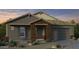 Charming single-story home features a stylish brick facade and a two-car garage at 20747 E Arroyo Verde Dr, Queen Creek, AZ 85142