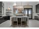 Elegant kitchen featuring a large island, pendant lighting, and stainless steel appliances at 20747 E Arroyo Verde Dr, Queen Creek, AZ 85142