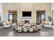 Well-designed lounge area with ample seating, stylish decor, and a cozy atmosphere at 20747 E Arroyo Verde Dr, Queen Creek, AZ 85142
