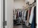 Walk-in closet with hanging clothes, shelves, and shoe racks for organized storage at 2206 S Ellsworth Rd # 160B, Mesa, AZ 85209