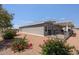Home exterior showcasing a covered patio and beautiful landscaping at 2206 S Ellsworth Rd # 160B, Mesa, AZ 85209