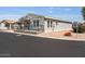Well-maintained single-Gathering home featuring a 9th Street sign, showcasing the property's location at 2206 S Ellsworth Rd # 160B, Mesa, AZ 85209