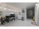 Epoxy-floored garage space with overhead lighting and ample room for storage at 2206 S Ellsworth Rd # 160B, Mesa, AZ 85209