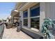 Charming outdoor patio with comfortable seating, perfect for relaxing and enjoying neighborhood views at 2206 S Ellsworth Rd # 160B, Mesa, AZ 85209