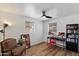 Home office/bedroom with ample natural light and hardwood floors at 2223 E Roma Ave, Phoenix, AZ 85016