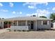 Charming single-story home with a well-maintained front yard and covered entry at 2223 E Roma Ave, Phoenix, AZ 85016