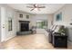 Comfortable living room with fireplace, tile floors, and modern furnishings at 225 W 1St St # 107, Mesa, AZ 85201