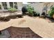 Charming courtyard featuring brick pavers, comfortable seating, fountain and desert landscaping at 23309 N Las Positas Ct, Sun City West, AZ 85375
