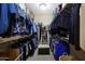 Walk-in closet with clothing racks, shelving, and shoe organizer at 23309 N Las Positas Ct, Sun City West, AZ 85375