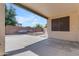 Covered back patio with a view of the backyard and block fence at 29475 N Candlewood Dr, San Tan Valley, AZ 85143