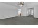 Spacious primary bedroom featuring vaulted ceilings and a fan at 29475 N Candlewood Dr, San Tan Valley, AZ 85143