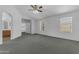 Spacious primary bedroom featuring vaulted ceilings and a fan at 29475 N Candlewood Dr, San Tan Valley, AZ 85143