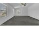 Spacious primary bedroom featuring vaulted ceilings and a fan at 29475 N Candlewood Dr, San Tan Valley, AZ 85143