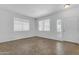 Inviting entryway features large windows, tiled floors, and a bright, welcoming atmosphere at 29475 N Candlewood Dr, San Tan Valley, AZ 85143