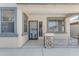 Inviting front porch with decorative security screen door and stone accents, great curb appeal at 29475 N Candlewood Dr, San Tan Valley, AZ 85143