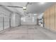 Spacious three car garage with built in cabinets and storage racks at 29475 N Candlewood Dr, San Tan Valley, AZ 85143