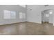 Bright, spacious living room with high ceilings and many windows offers ample natural light at 29475 N Candlewood Dr, San Tan Valley, AZ 85143