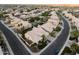 This beautiful aerial view showcases a desert community with well-maintained homes and landscaping at 3102 E Desert Broom Way, Phoenix, AZ 85048