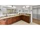 Bathroom features double sinks, granite countertops, and built-in storage at 3102 E Desert Broom Way, Phoenix, AZ 85048