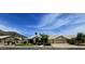 Charming single-story home with desert landscaping, mountain views, and a three-car garage at 3102 E Desert Broom Way, Phoenix, AZ 85048