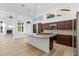 Bright open kitchen featuring an island, granite counters, stainless steel appliances at 3102 E Desert Broom Way, Phoenix, AZ 85048