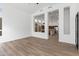 Open-concept living area showcasing views into a modern kitchen at 3102 E Desert Broom Way, Phoenix, AZ 85048