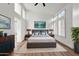 Main bedroom featuring modern decor, a spacious layout, and ensuite access at 3102 E Desert Broom Way, Phoenix, AZ 85048