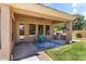 Inviting covered patio with comfortable seating, a ceiling fan, and a built-in barbecue at 3225 E Cardinal Ct, Chandler, AZ 85286