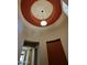 Dramatic foyer with circular ceiling design and modern pendant lighting, creating a grand entrance at 3225 E Cardinal Ct, Chandler, AZ 85286