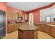 Spacious kitchen featuring a large island, wooden cabinets, and modern appliances, perfect for cooking and entertaining at 3225 E Cardinal Ct, Chandler, AZ 85286