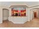 Open kitchen with a large counter pass-through, a center island, and ample cabinet space at 3225 E Cardinal Ct, Chandler, AZ 85286