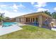 A serene pool and spa area are surrounded by lush landscaping and a backyard patio at 3225 E Cardinal Ct, Chandler, AZ 85286