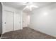 Bright bedroom featuring closet and ceiling fan at 3444 E Flamingo Ct, Gilbert, AZ 85297