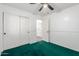 Bright bedroom with closet and ceiling fan at 3444 E Flamingo Ct, Gilbert, AZ 85297