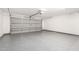 Spacious garage with epoxy flooring and ample room for parking and storage at 3444 E Flamingo Ct, Gilbert, AZ 85297