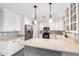 Bright kitchen features stainless steel appliances, white cabinetry, stylish countertops and decorative backsplash at 3444 E Flamingo Ct, Gilbert, AZ 85297