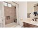 Bathroom featuring tile shower with recessed shelf, toilet and vanity with granite countertop at 36674 N Vasari Dr, Scottsdale, AZ 85262