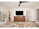 Open living space with tiled flooring, a large cactus print, ceiling fan, and comfortable seating at 36674 N Vasari Dr, Scottsdale, AZ 85262
